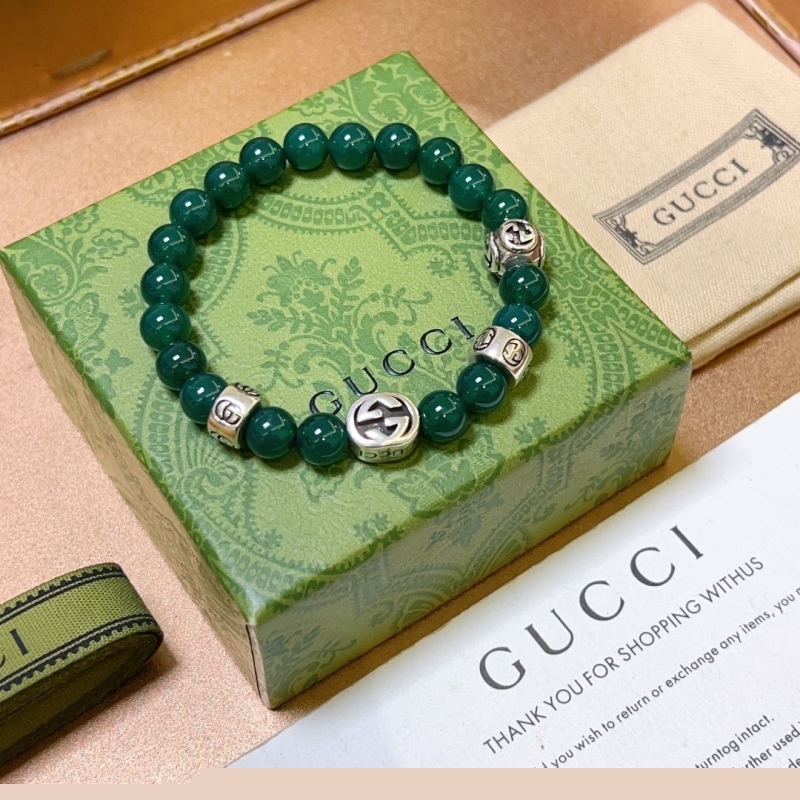 G*u*i bracelets